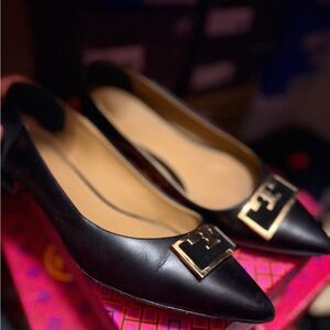Tory Burch Black Flats with Gold Accents